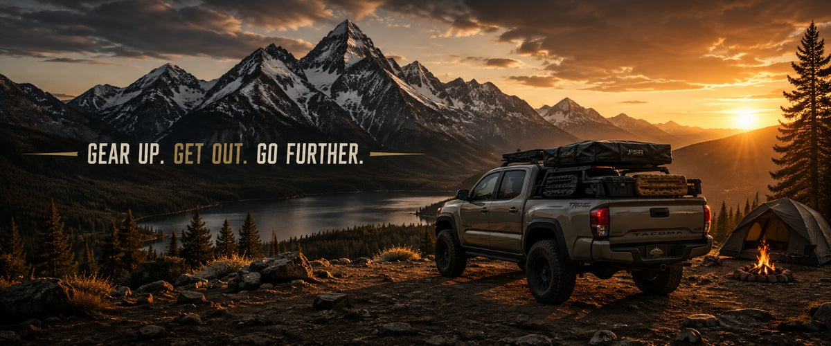 Adventure Essentials Tacoma overland truck at a mountain campsite during sunset